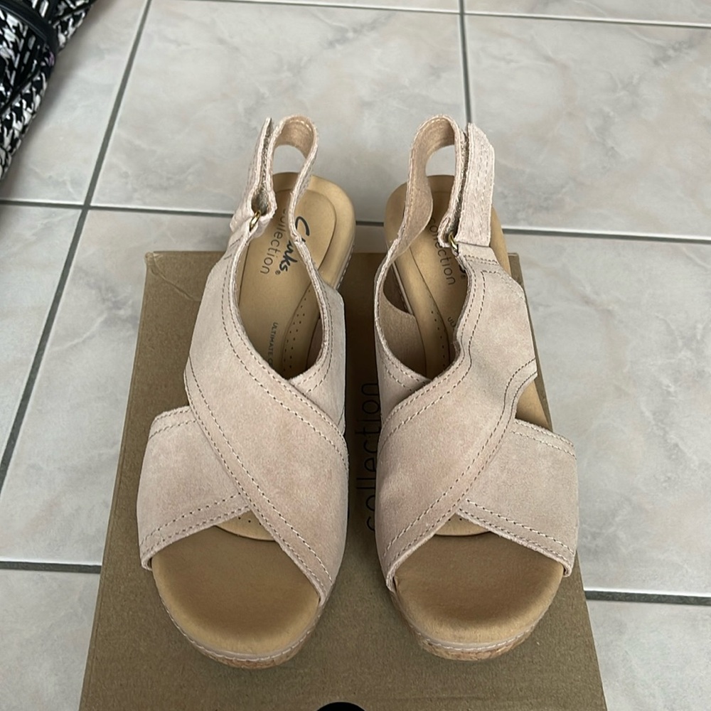 Brand new Clark’s tan wedge sandals